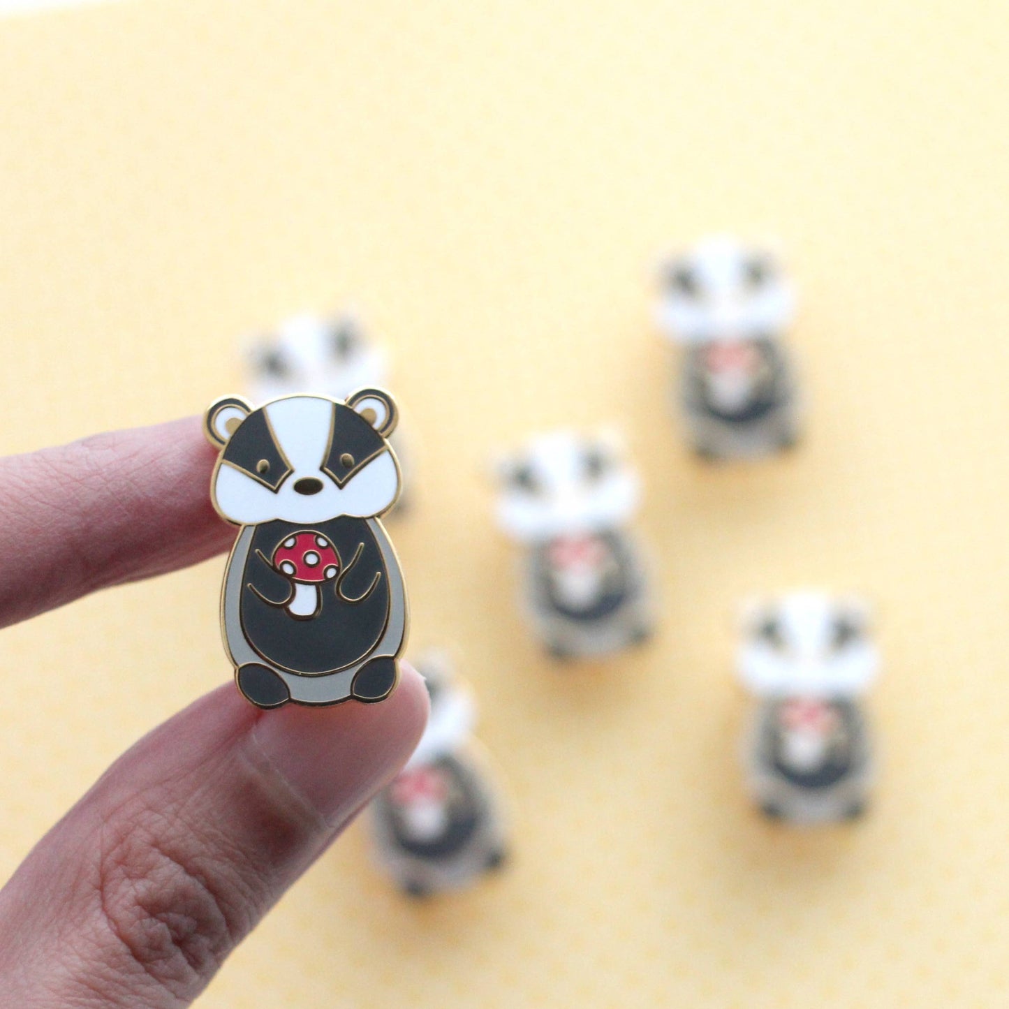 Badger and Red Mushroom Enamel Pin (Black Variant)