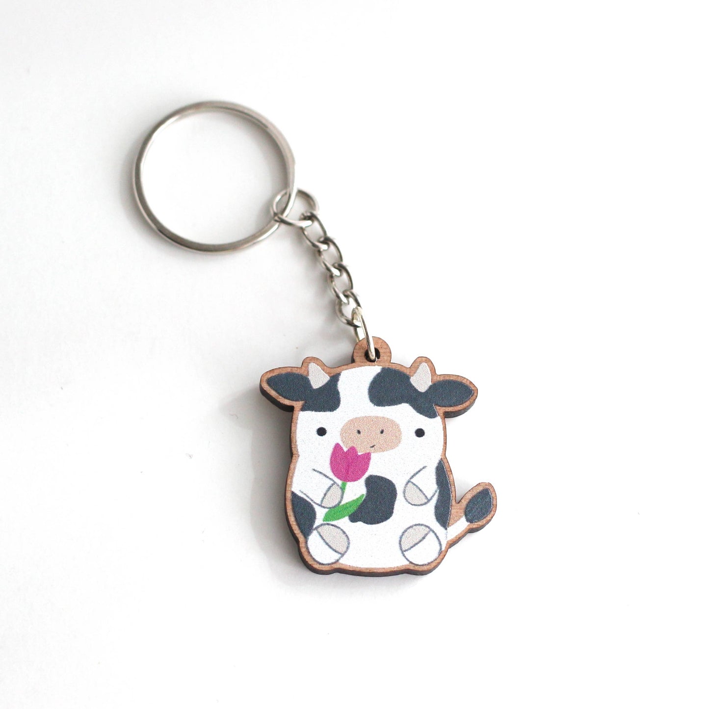 Cow holding a Tulip Wooden Keychain. Cute Cow Wood Charm