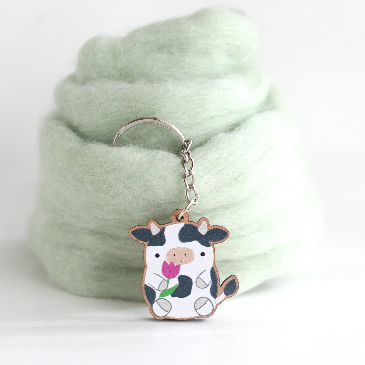 Cow holding a Tulip Wooden Keychain. Cute Cow Wood Charm